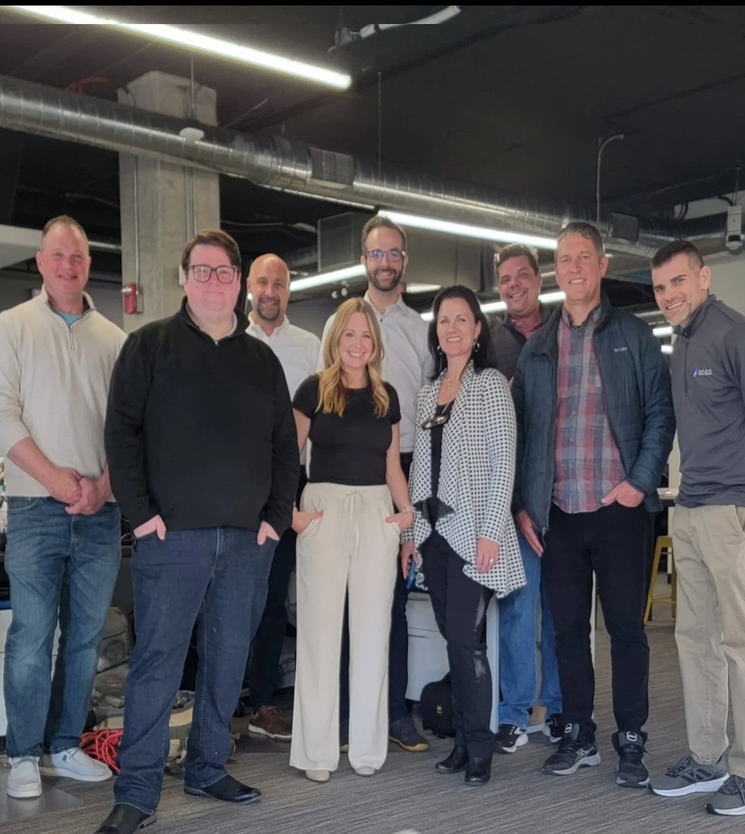 Photo of a team of people smiling